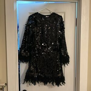 Black sequin and feather cocktail dress